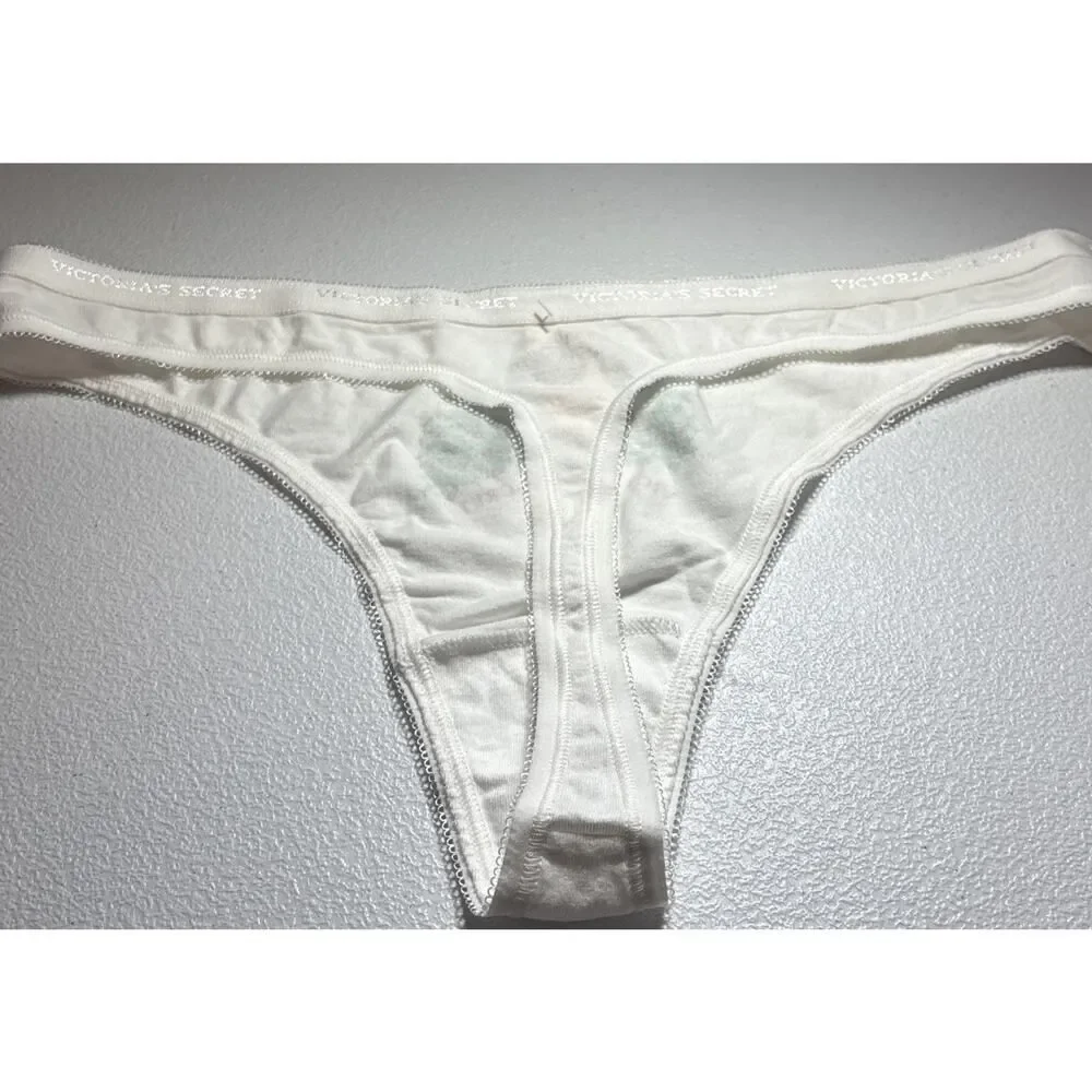 VTG. Victoria Secret white with Peacock image Thong Size LG. NEW Cotton